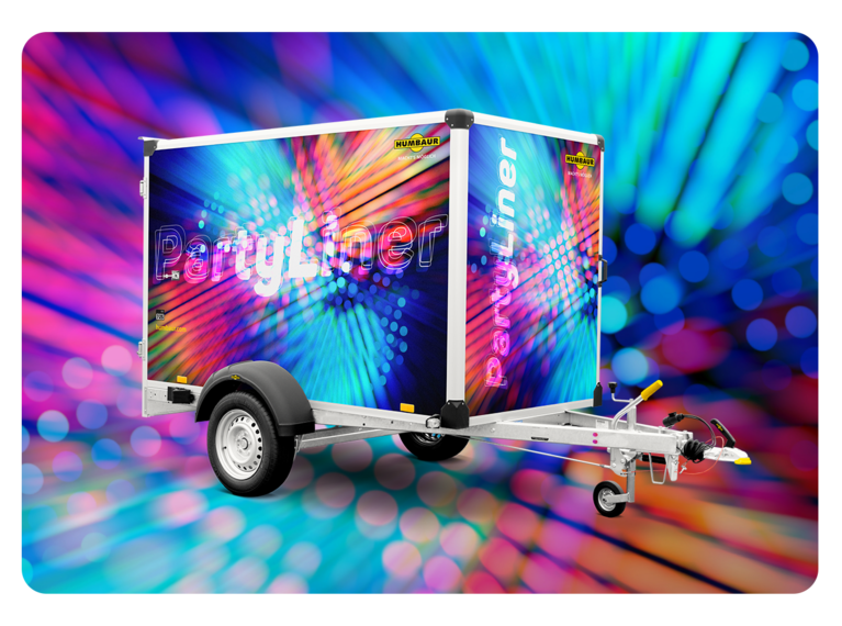 PartyLiner | © Humbaur GmbH Humbaur Kofferanhänger PartyLiner auf buntem Hintergrund | © Humbaur GmbH
